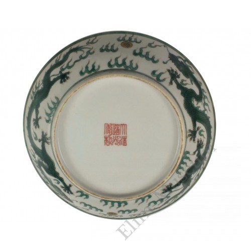 1049 A famille rose dish with dragon chasing peal  