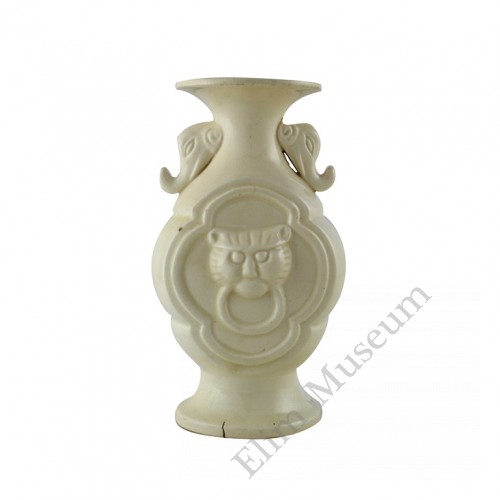 1132   A Ding-Ware  vase with mold tiger heads.  