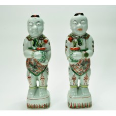 1136 A pair of Wucai painted lotus-boy  status 