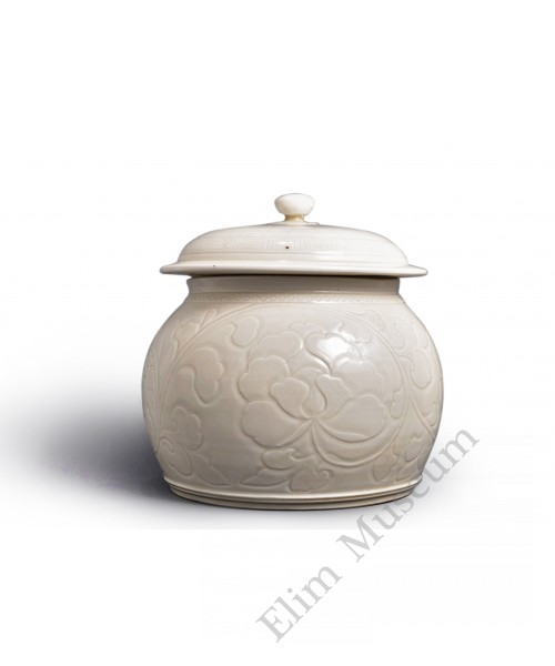 1597  A Song Ding-ware white glaze carved-lotus jar  