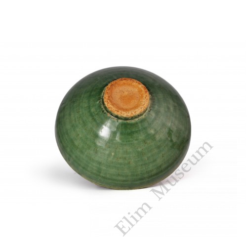 1618 A Jizhou-ware green glaze playing-babe bowl 