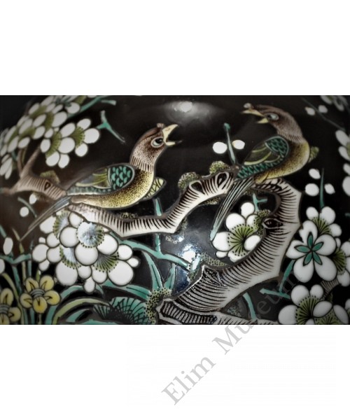 1636 A famille noire bowl with magpies in plum flowers    