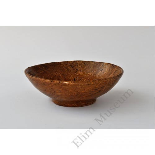 1663 A marble-glazed wooden grain bowl  