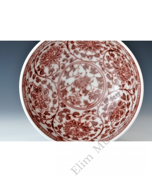 1678 An under glaze red florist scrolls bowl  