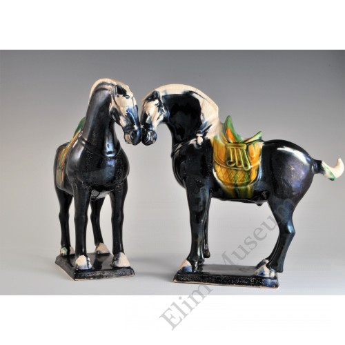 1684 A Pair of Molded and Sculpted Horse with Saddles  
