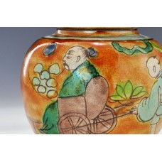 1693 A Wucai small lidded figured jar  