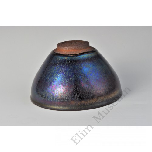 1699  A Jian stone-ware iridescent black glaze conical tea bowl  
