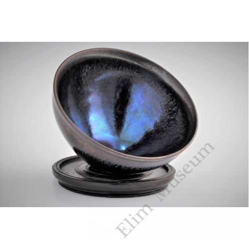1699  A Jian stone-ware iridescent black glaze conical tea bowl  