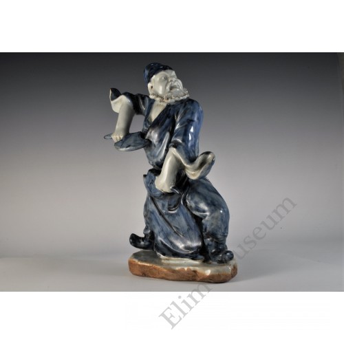 1743 A sculpted undergrlaze blue figure      
