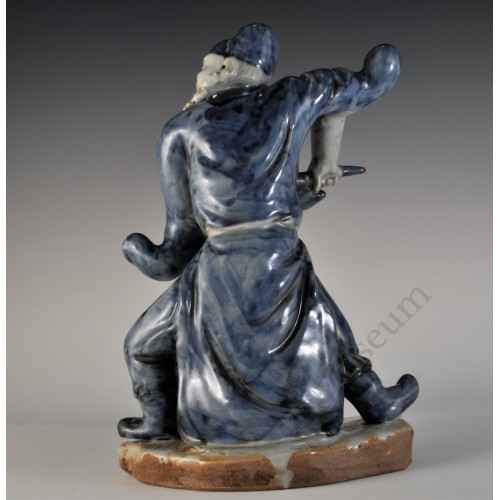 1743 A sculpted undergrlaze blue figure      