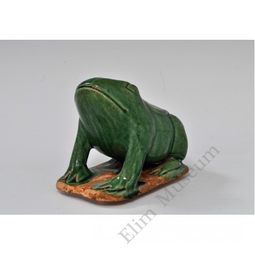 1745 A molded and sculpted green glaze frog   