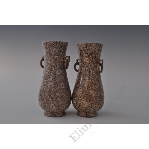 1747 A pair of marbled (jiaotai) pattern double handled vases 