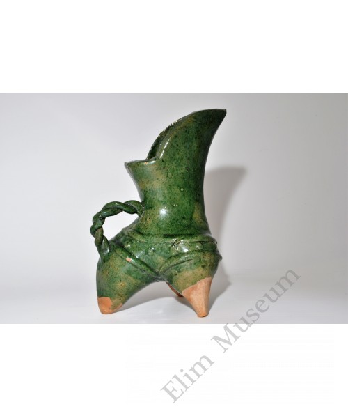 1777  A Green Glaze Wine Container 
