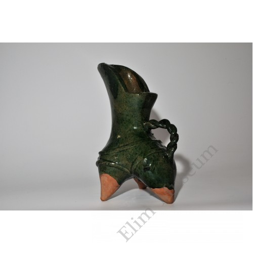 1777  A Green Glaze Wine Container 