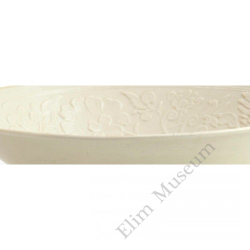 1280 A Ding-Ware white glaze carved flowers and phoenixes bowl