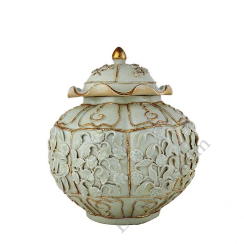 1318 A Yuan Egg-White glaze lidded jar with molded petals  