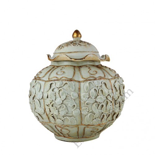 1318 A Yuan Egg-White glaze lidded jar with molded petals  